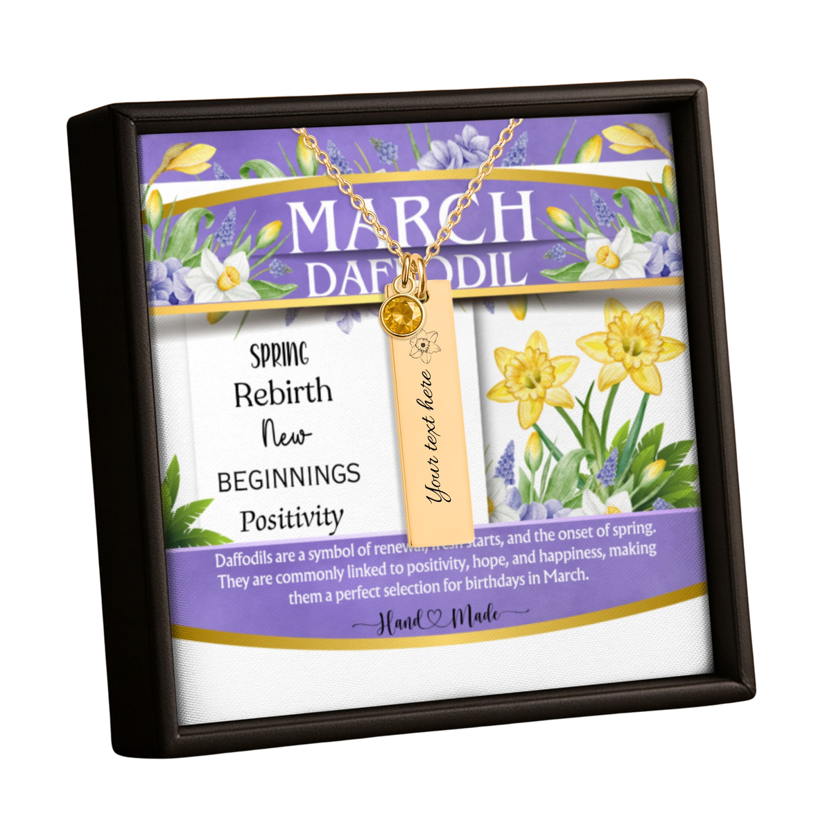 A framed March Daffodil themed gift box with a gold necklace and a personalized tag, featuring spring text and yellow daffodil illustrations.