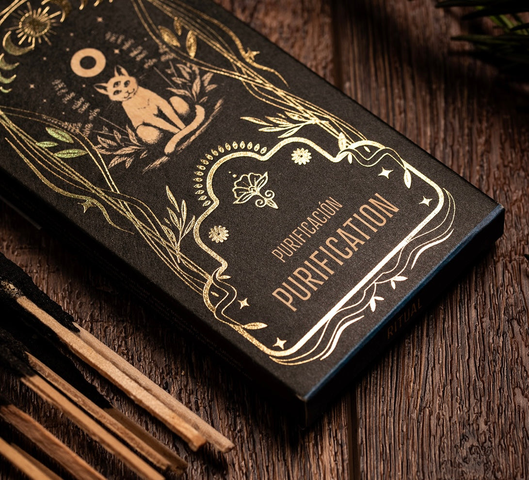 Black box labeled 'Purification' with gold text and design on a wooden surface.