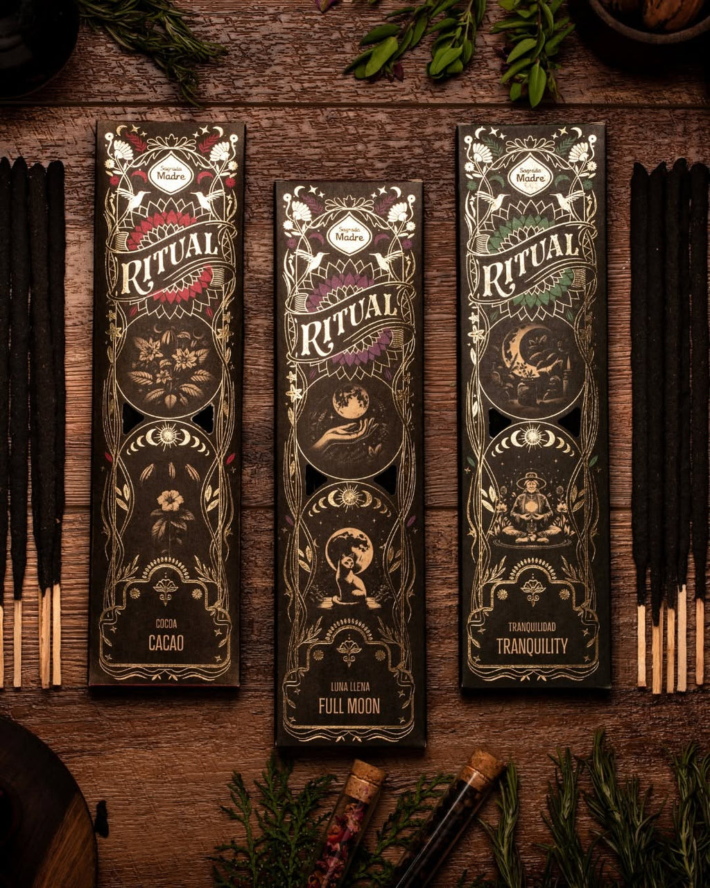 Three 'Ritual' chocolate bars on a wooden surface with candles and greenery.