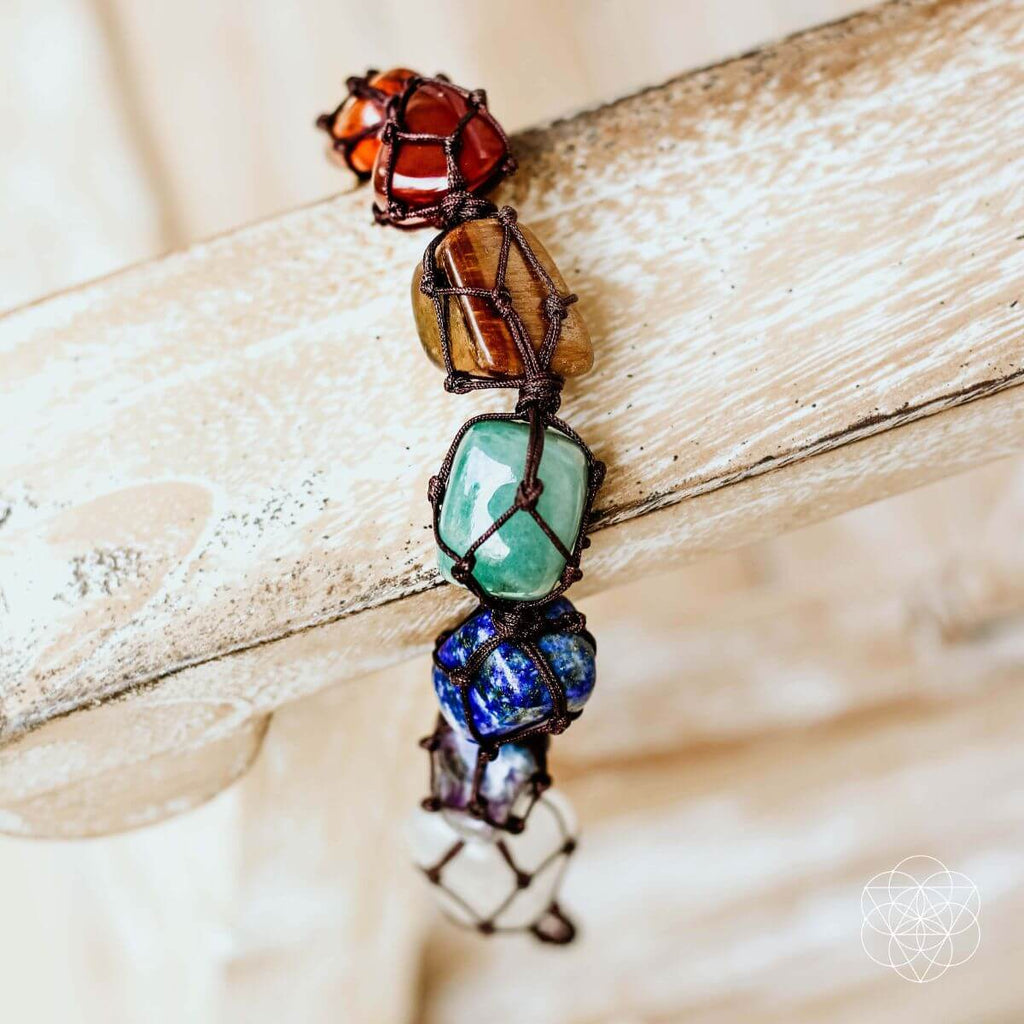Necklace with colorful beads on a wooden surface