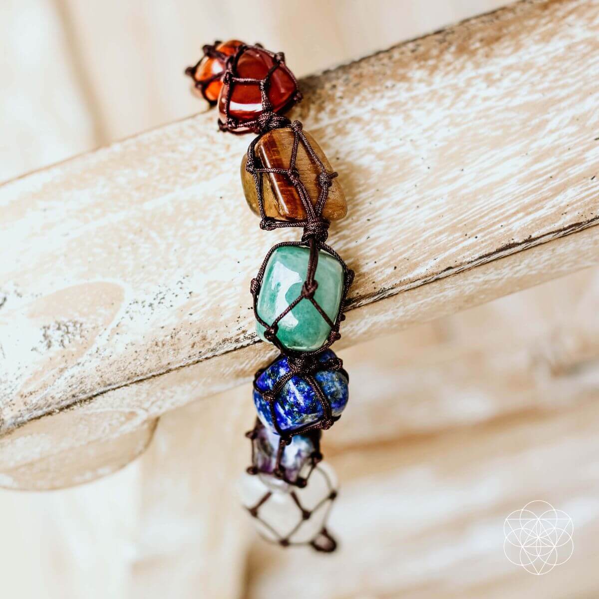 Necklace with colorful beads on a wooden surface