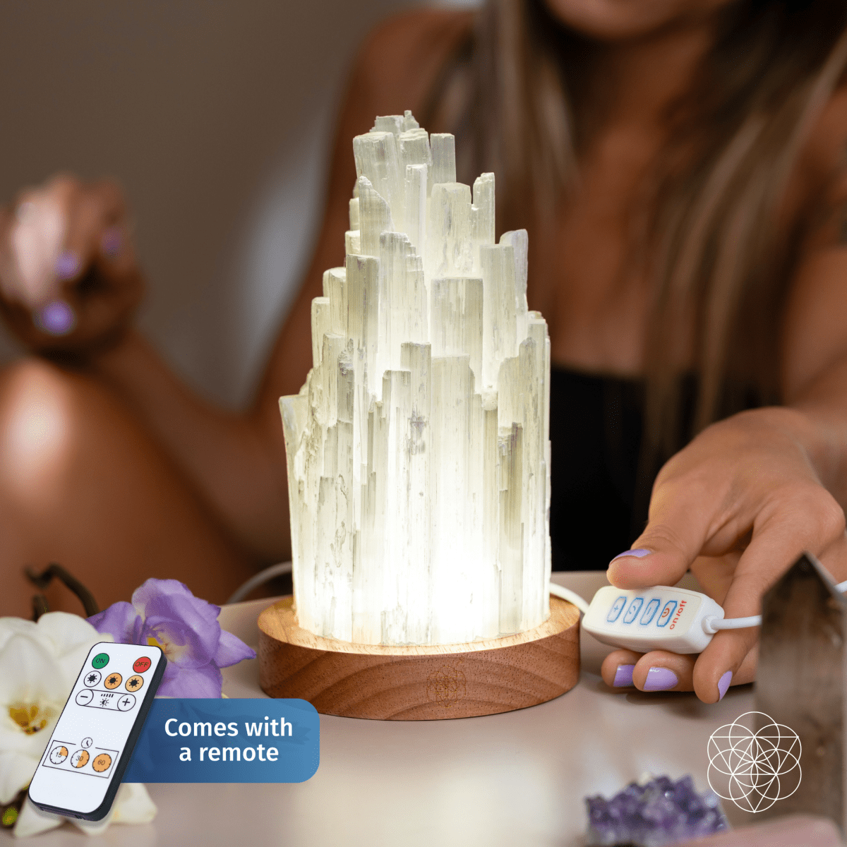 Decorative crystal lamp with remote control on a table